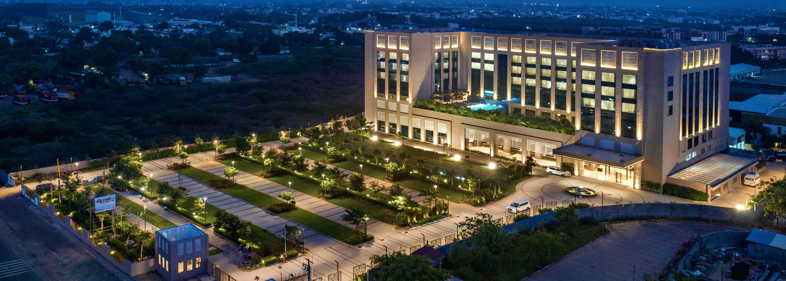 Side view of Grand Chennai By GRT Hotels during evening time.