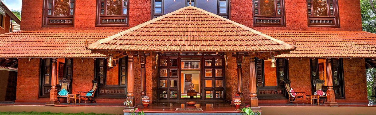 facade image of the malnad palace at hoysala village resort, hassan.