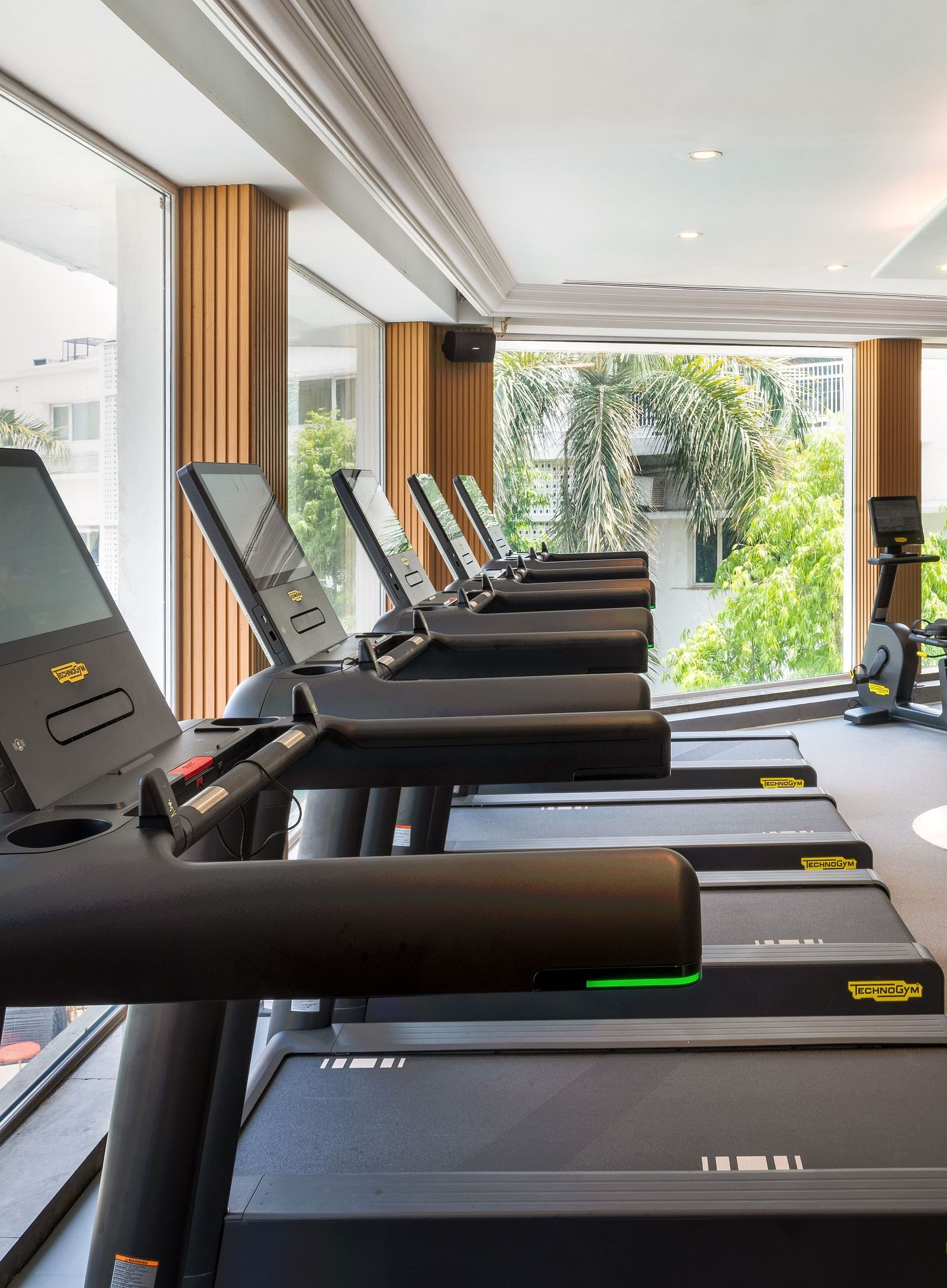 Side veiw  the gym with thread mill at The Claridges New Delhi
