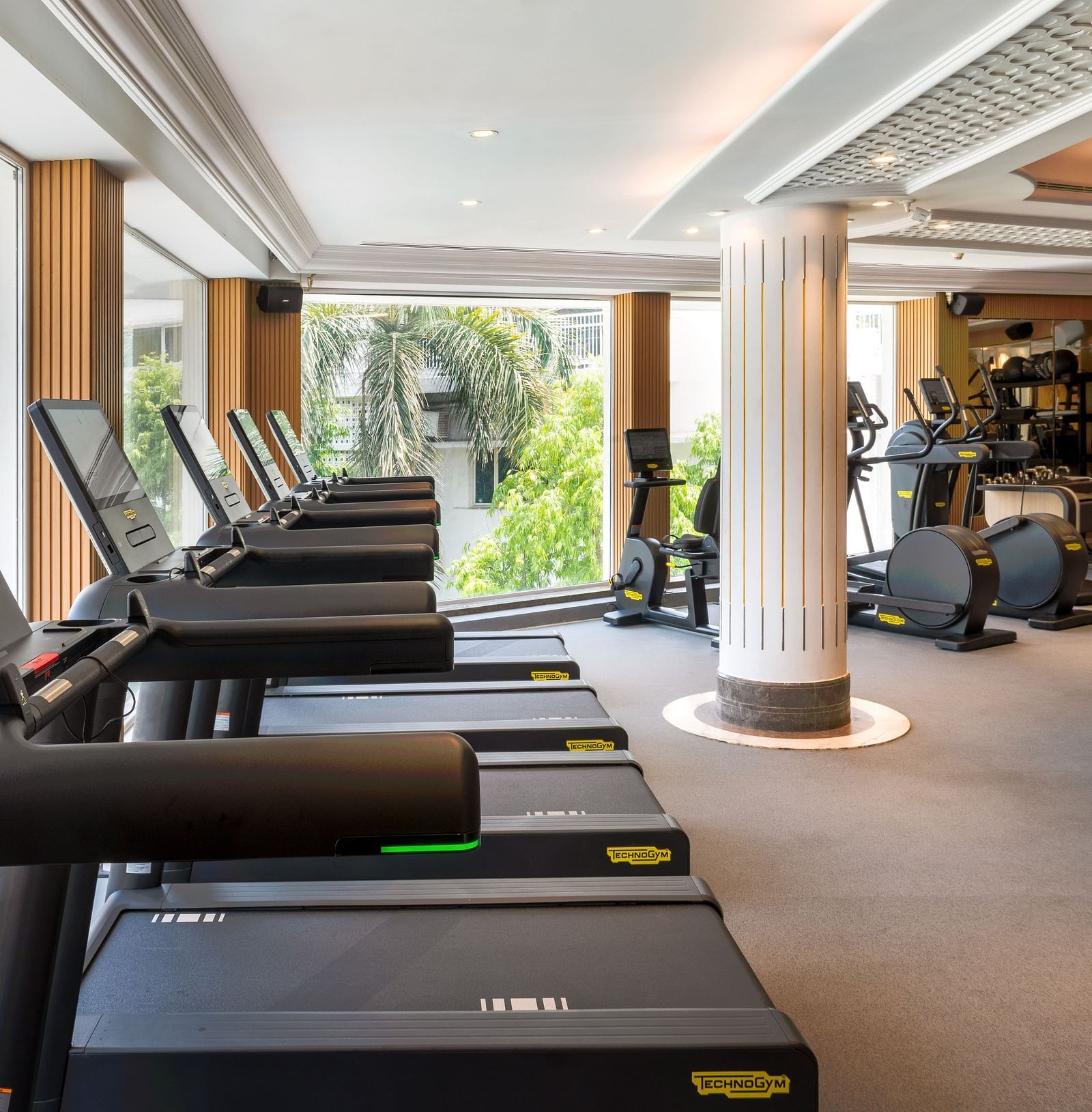 Side veiw  the gym with thread mill at The Claridges New Delhi