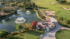Overview of restaurant next to a lake at Karma Lakelands.