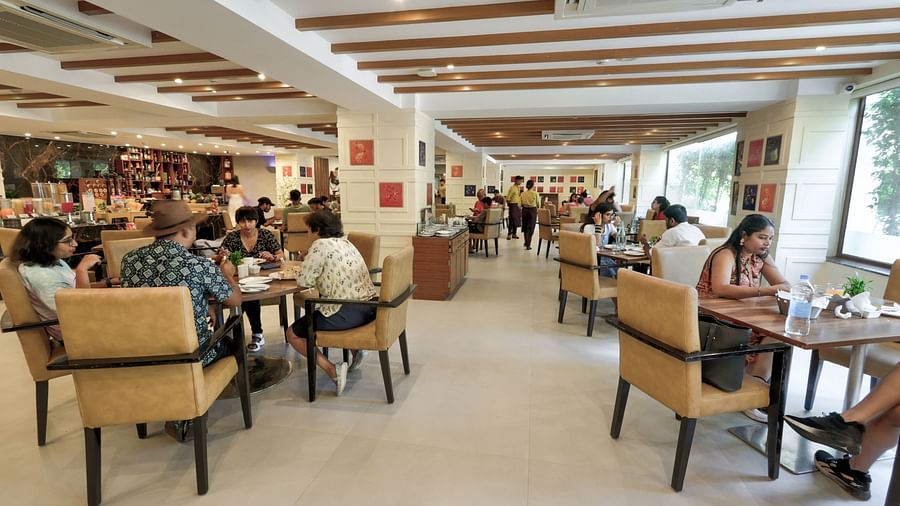 People enjoying their meals at Sobit Sarovar Portico, Goa