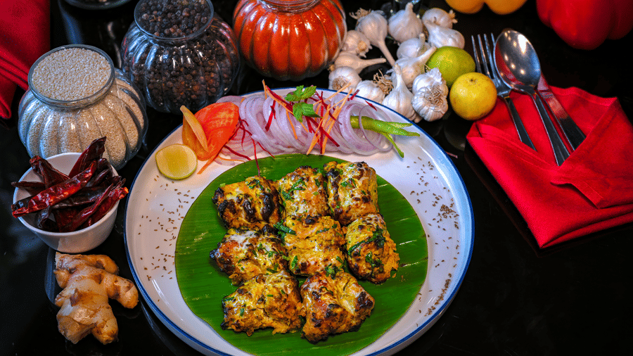 A platter placed on a plate at a dining space at Clarks Hotels.