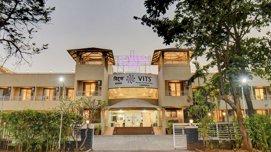 Main entrance of the hotel with welcoming exterior design at VITS Lonavala.