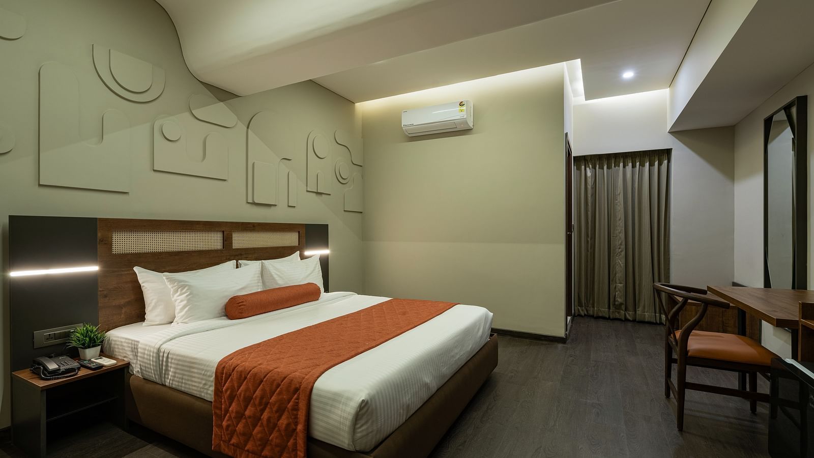 Elegant Tangerine Room offering modern amenities in a tranquil setting at Fressotel, Kanakapura Road.