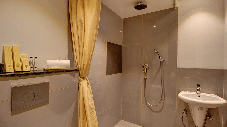 overview of the shower area inside Two bedroom Executive Suite - Rhythm Gurugram