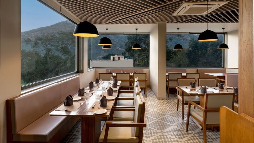 dining setting of Lumbini Restaurant at Stone Wood Hotel, Kumbhalgarh
