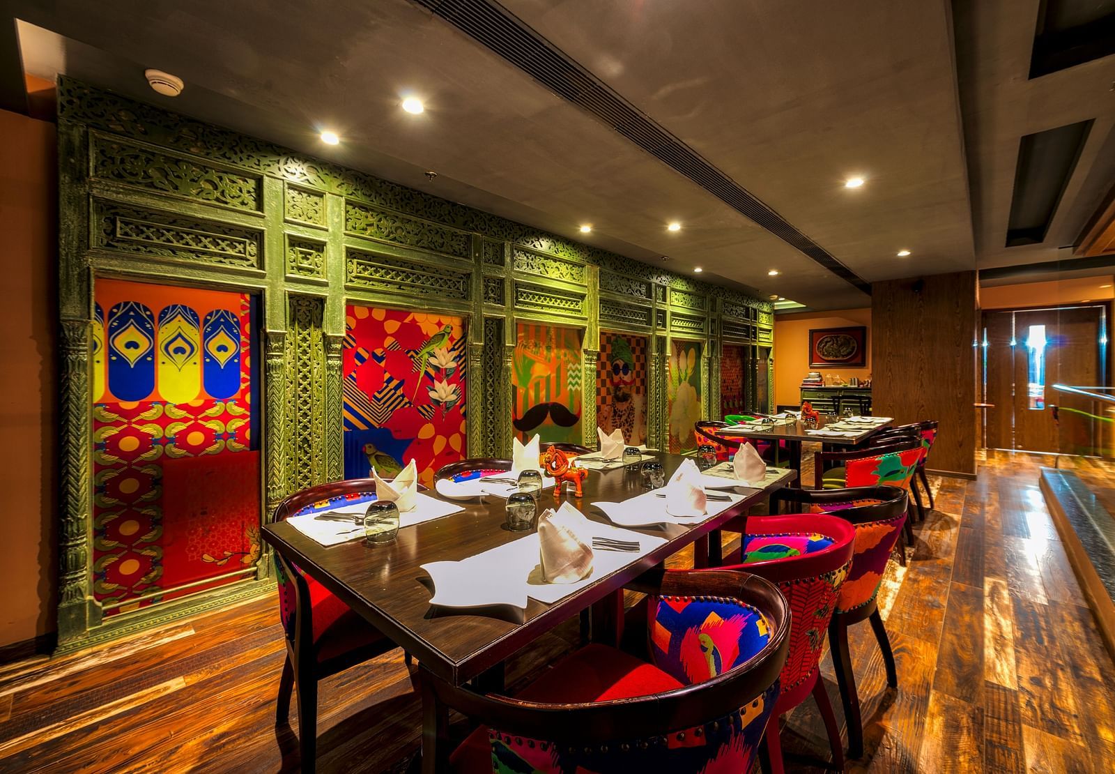 Seating arrangement of the restaurant at Grand Chennai By GRT Hotels.
