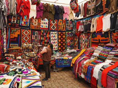 Colourful Kumaoni handicrafts and textiles at a local market near Bhimtal.