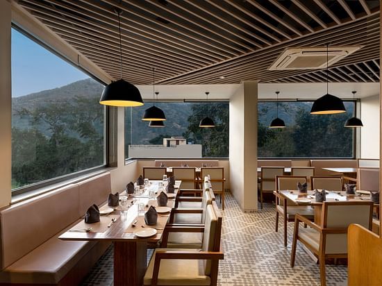 dining setting of Lumbini Restaurant at Stone Wood Hotel, Kumbhalgarh