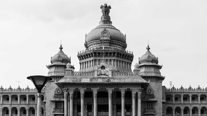 Black and white photograph of Vidhana Soudha the state legislature building in Bengaluru.