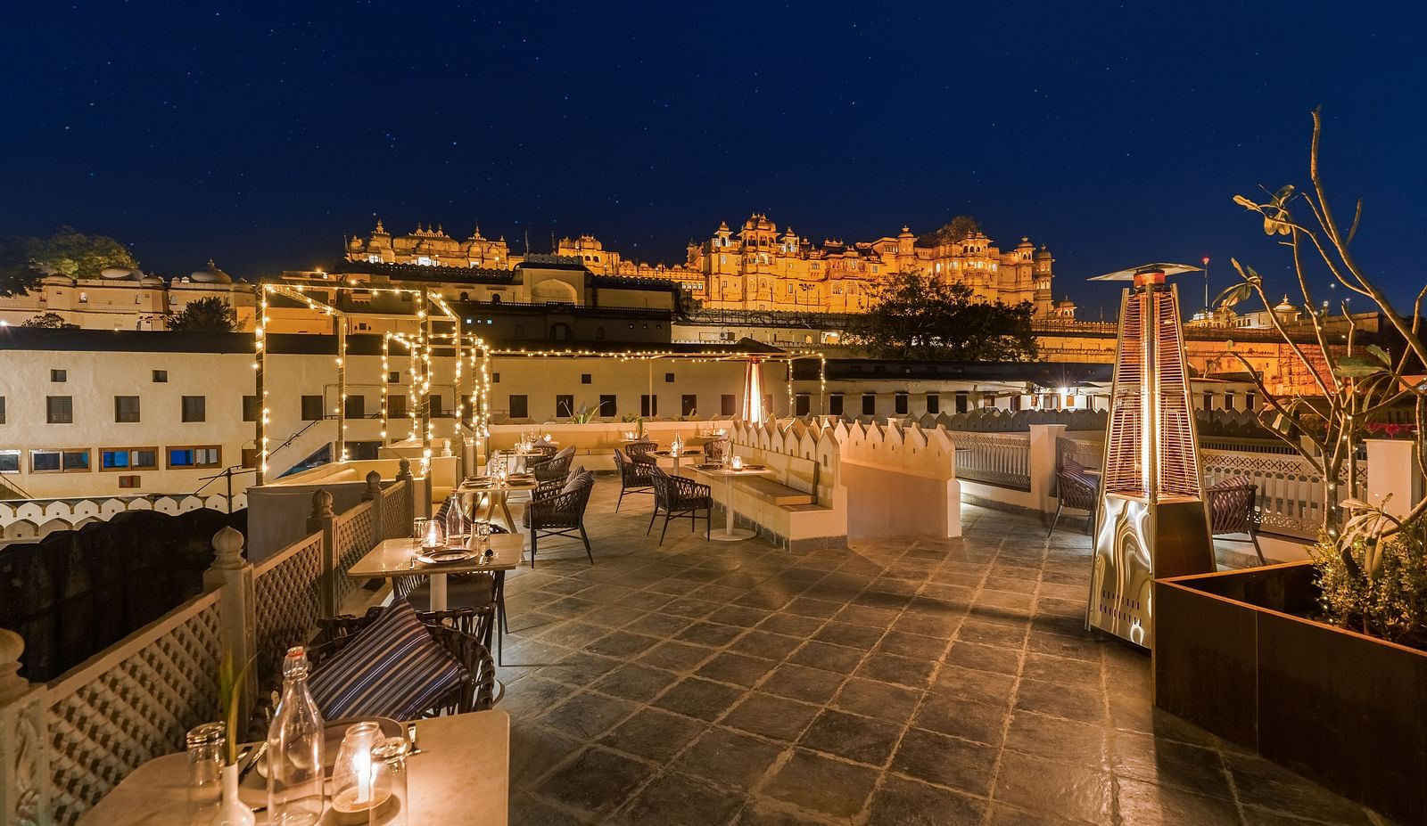 View from the al-fresco seating of Manuscript - Jhilwara Haveli, Udiapur in the night