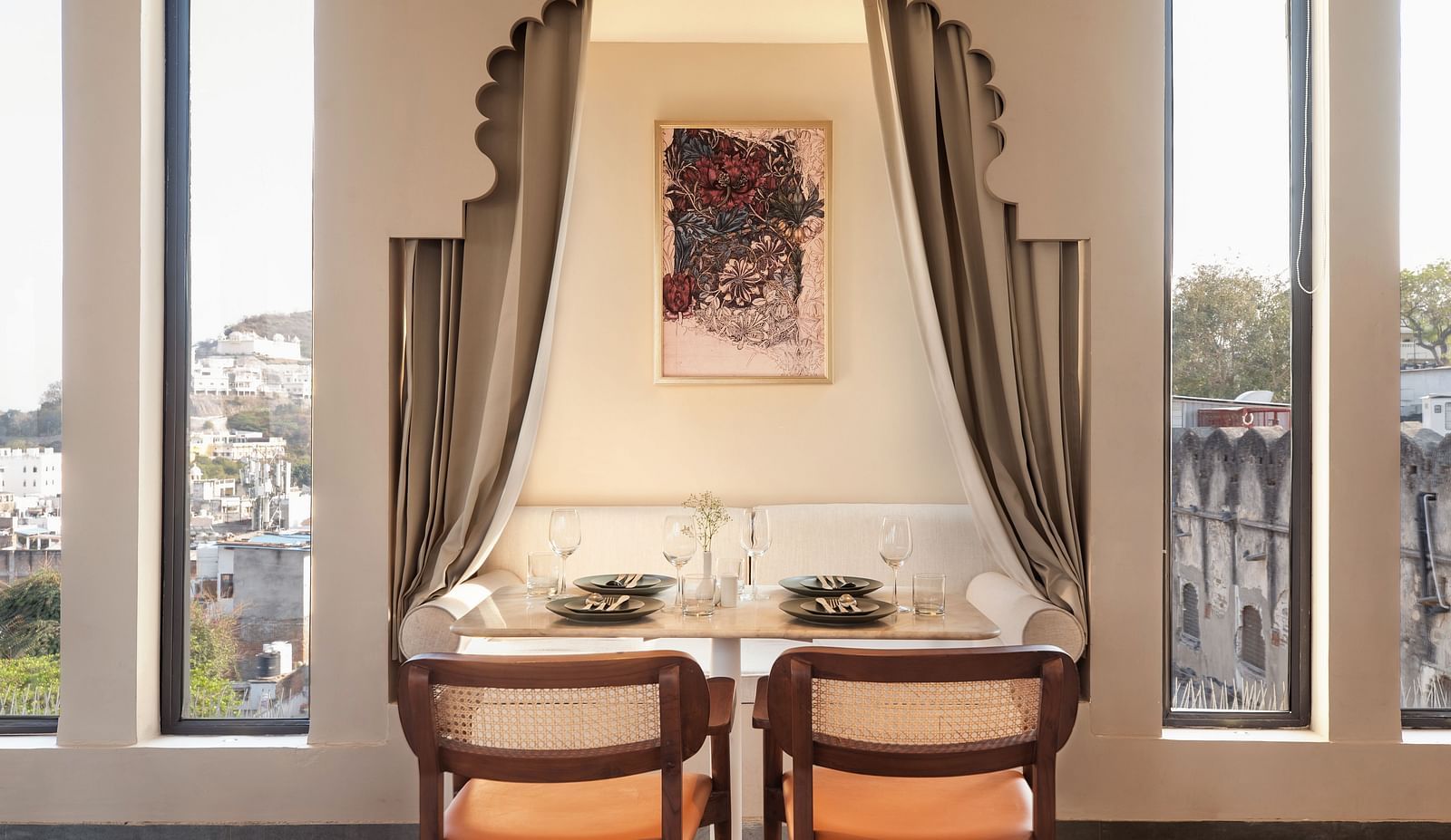Seating arrangements inside a restaurant at Manuscript - Jhilwara Haveli, Udaipur