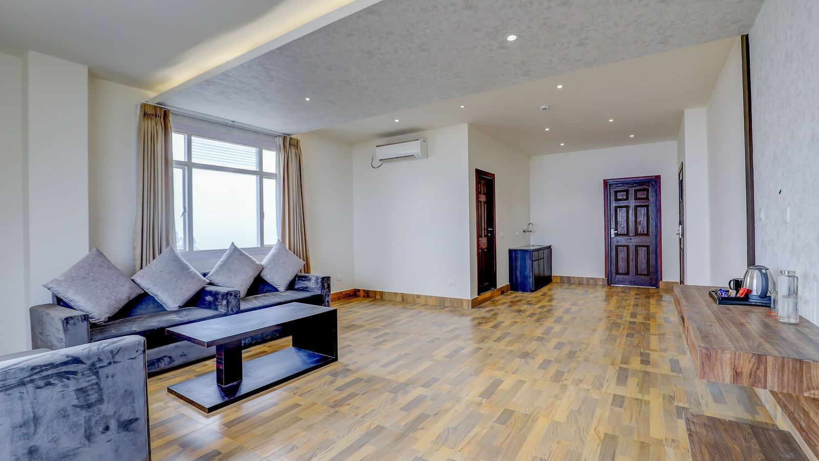 view of the living area with sofas of Suite at Banari Regency by Summit, Namchi
