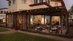 Elegant outdoor dining at Palms Restaurant, Kenilworth Resort & Spa, Goa - a premier 5-star resort in South Goa.