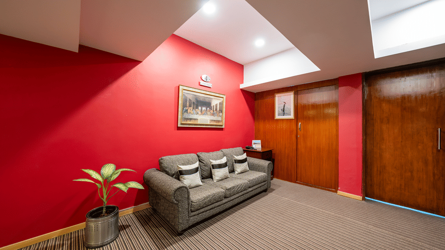 A lobby with sofas and wall arts. | MGM Mark Whitefield