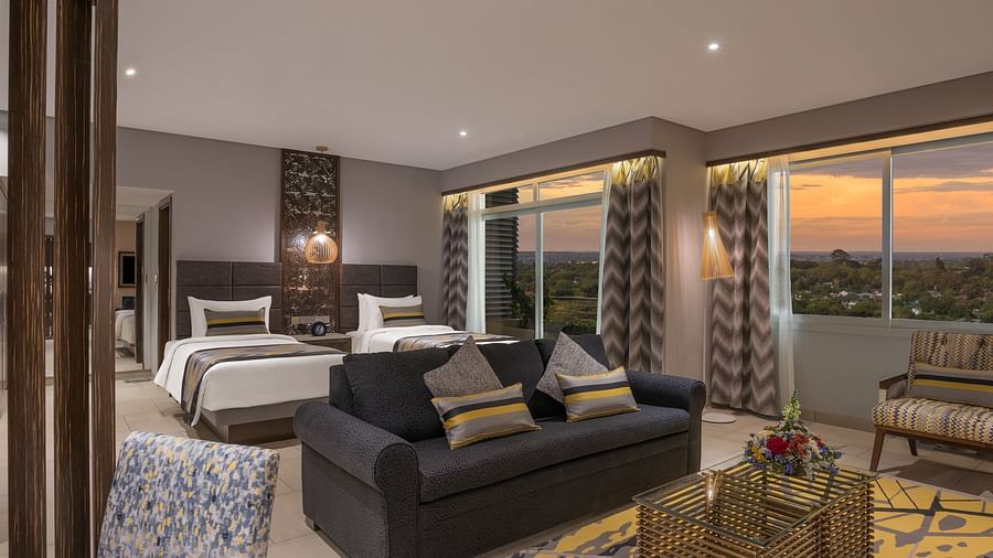 Executive Suite 1 - Bedroom Living Room angle 1 by night