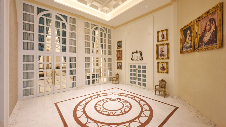 Indoor lobby area with patterned flooring and wall décor at Sarovar Premiere Amritsar.