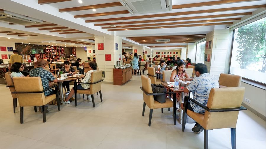 People enjoying their meals at Sobit Sarovar Portico, Goa