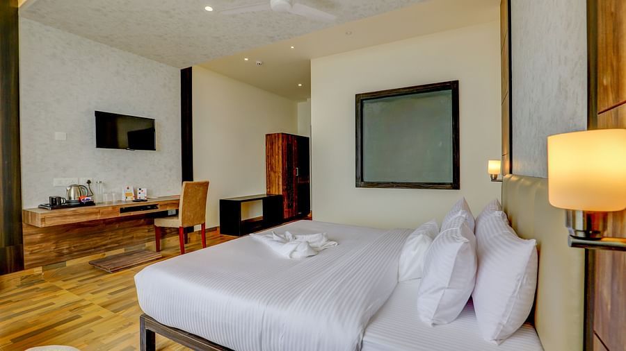 view of king size bed and TV of a Deluxe Room Banari Regency by Summit, Namchi
