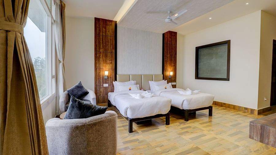 view of twin beds of a Premium Room at Banari Regency by Summit, Namchi