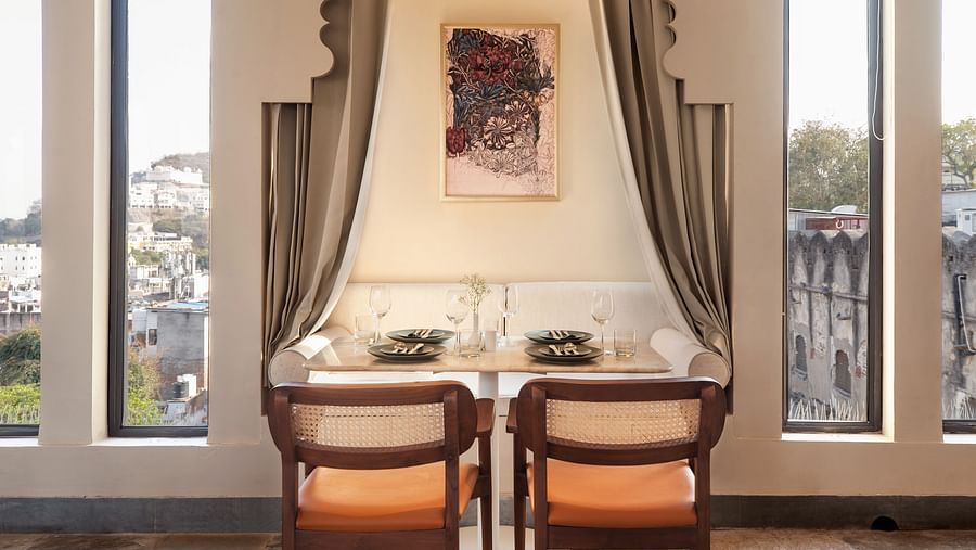 Seating arrangements inside a restaurant at Manuscript - Jhilwara Haveli, Udaipur