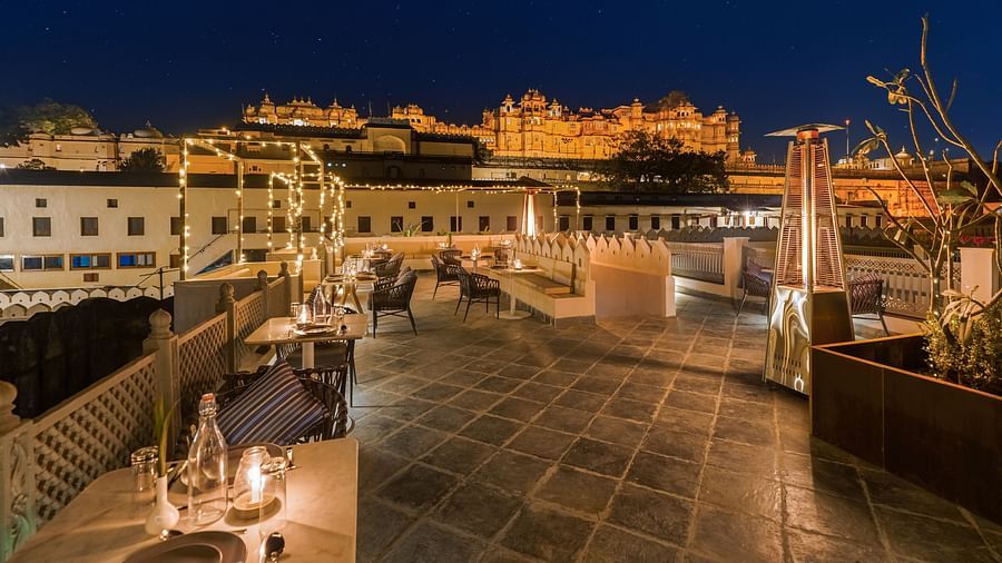 View from the al-fresco seating of Manuscript - Jhilwara Haveli, Udiapur in the night