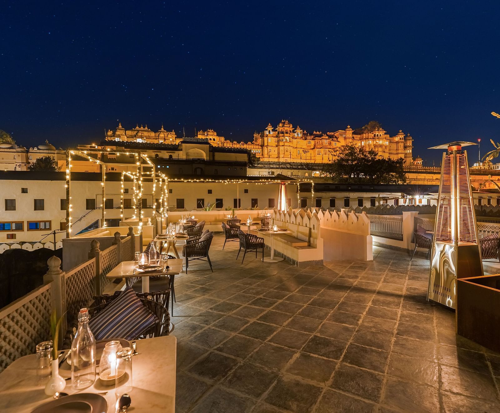View from the al-fresco seating of Manuscript - Jhilwara Haveli, Udiapur in the night