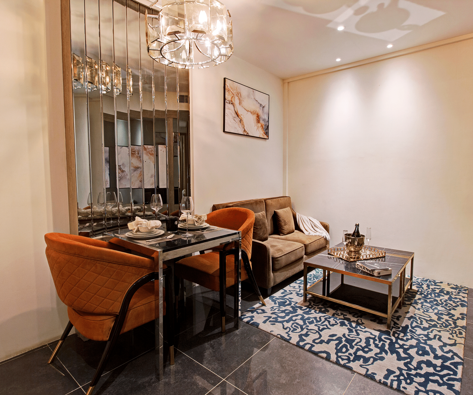 Sofas and coffee table kept inside the Living Room inside the deluxe room - Rhythm Gurugram