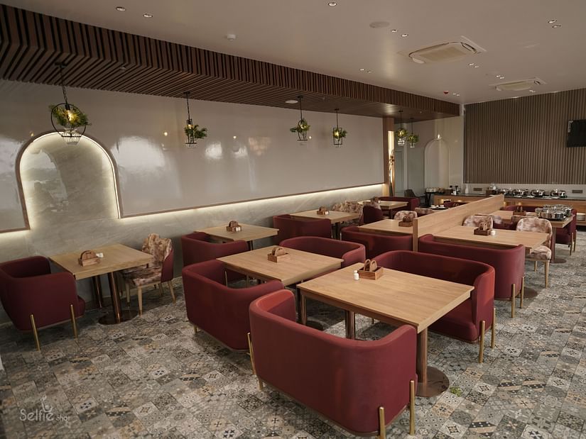 Well lit dining Area at Pride Comfort, Dwarka