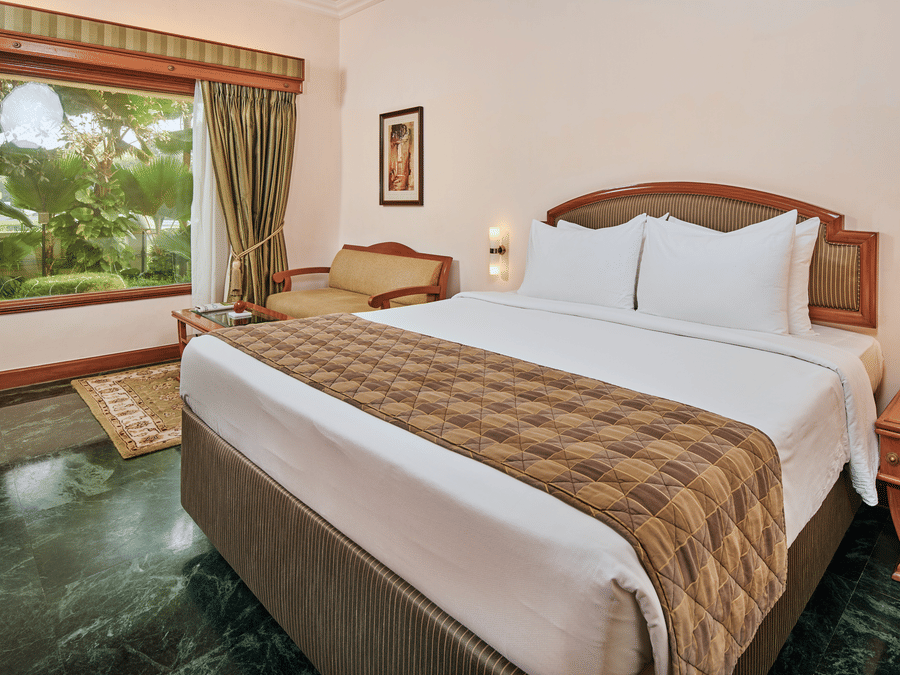 Deluxe guest room at The Ummed Ahmedabad luxury hotel