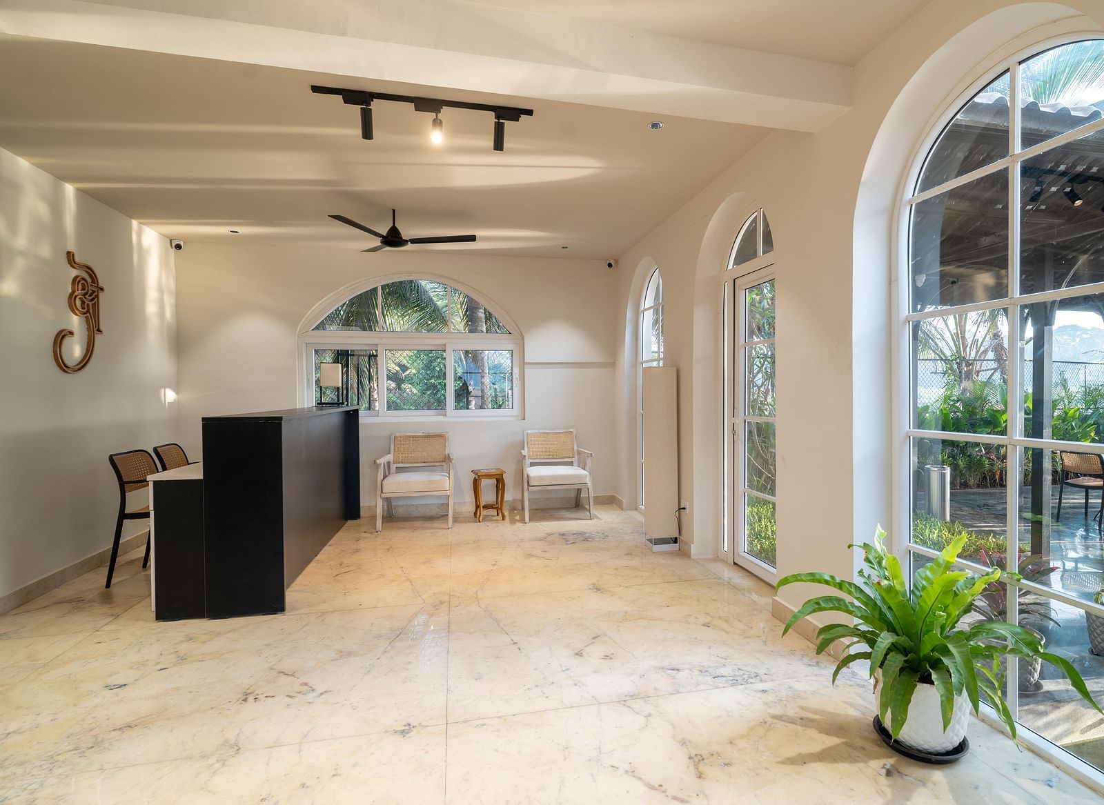 An airy and bright interior shot of a reception area at Kssemya.