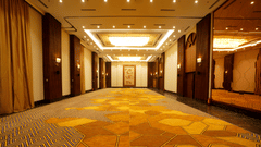 An image of an empty yet well-lit banquet hall  - Hotel Polo Towers, Agartala