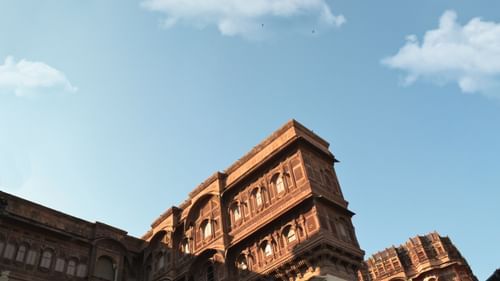 A view rom below of Bala Quila with blue sky in the background.