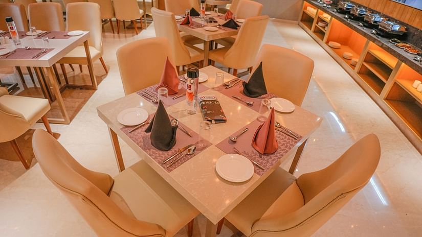 a table for 4 at our restaurant in Bangalore