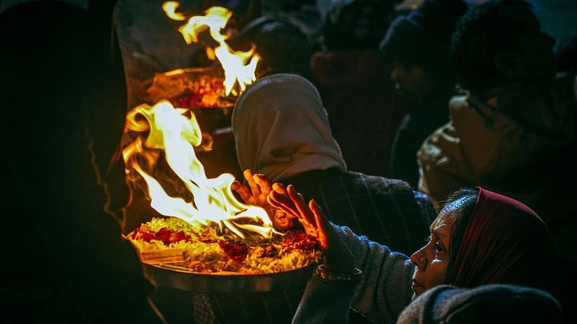 a shot of devotees praying 