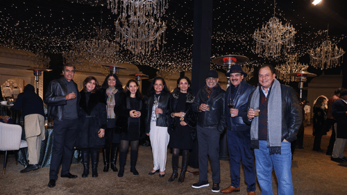 An image of a group of people standing in a line at Heritage Village Resorts & Spa