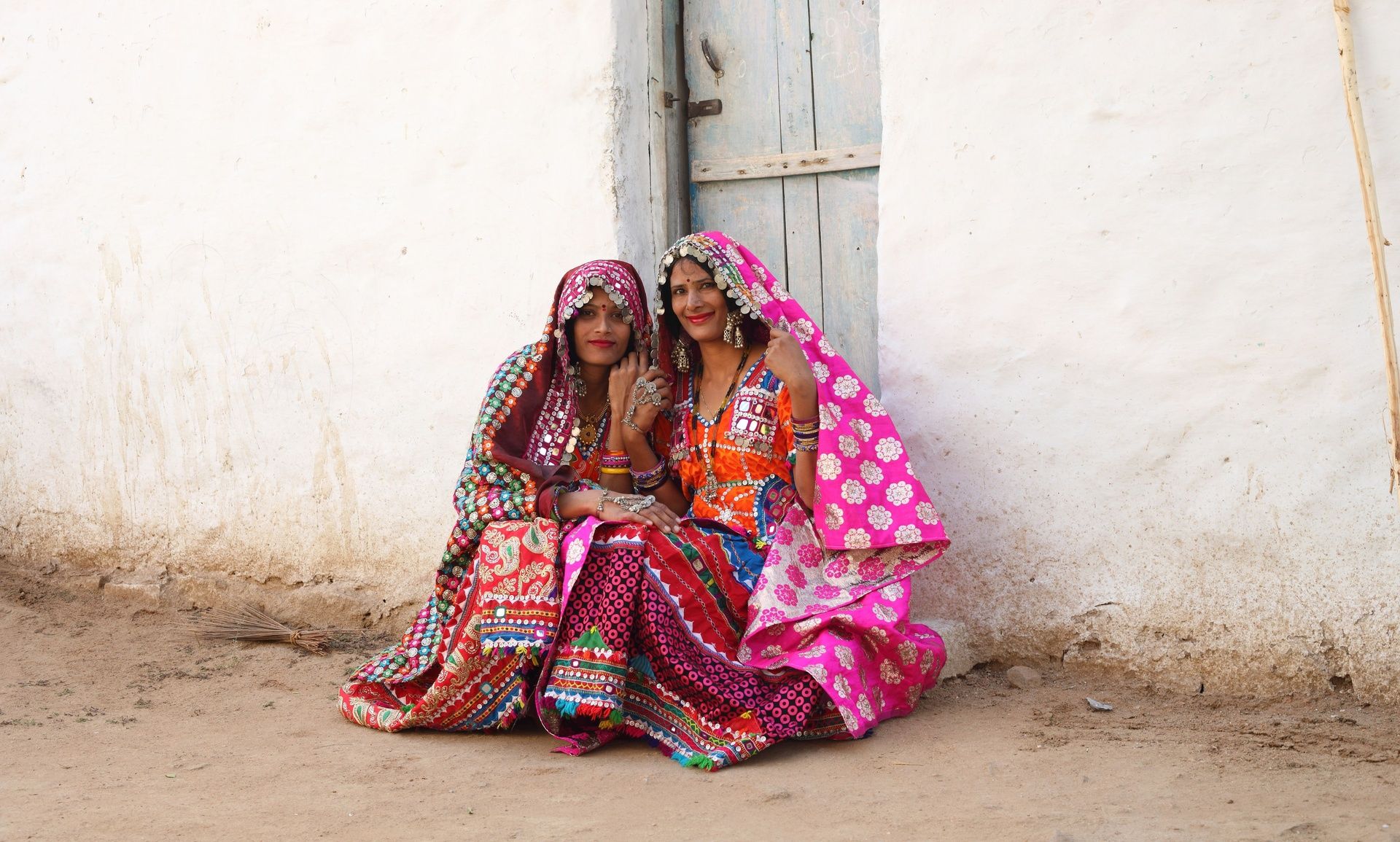 Two women in traditional Indian attire.