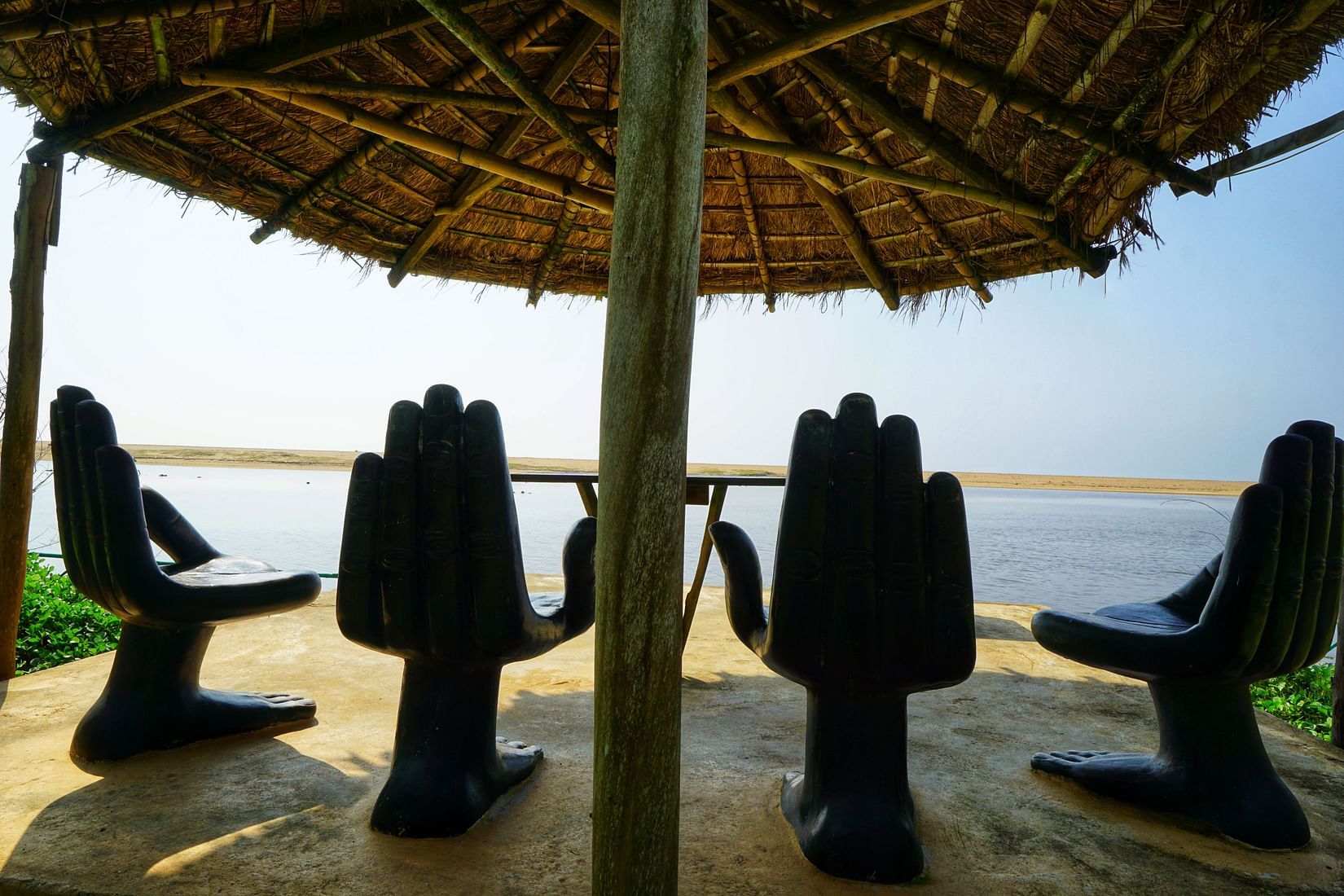 Sitting area and the chairs are the shape of a palm to sit and enjoy the sea view - Lotus Eco Resort Konark 