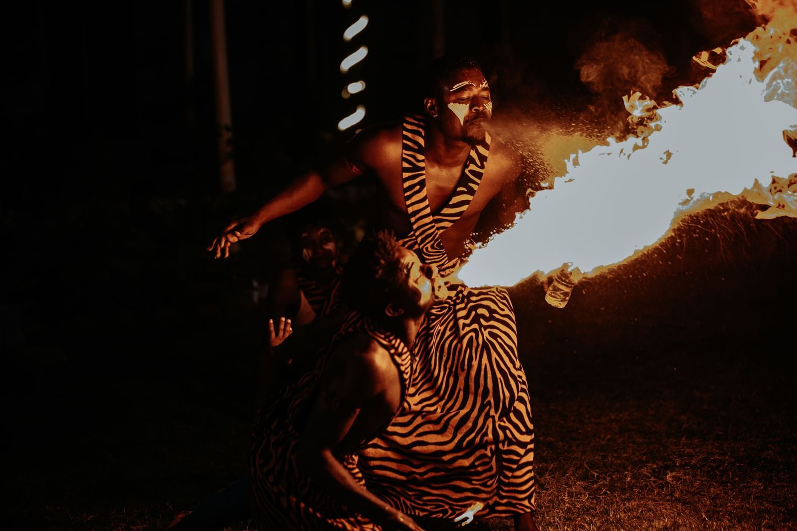 Two tribal dancers showcasing their skills and doing stunts with fire - Daksh Eden Greenz, Sasan Gir
