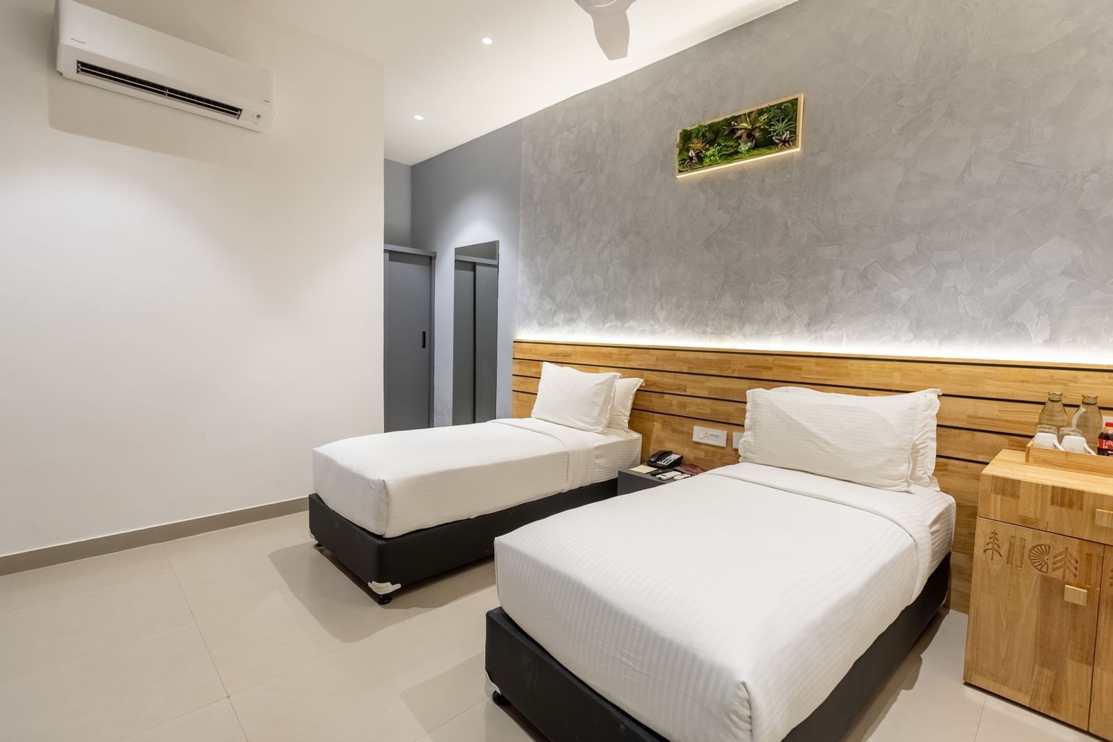 image of a bedroom featuring a twin bed at the luxury group stay villa - Darza Resorts