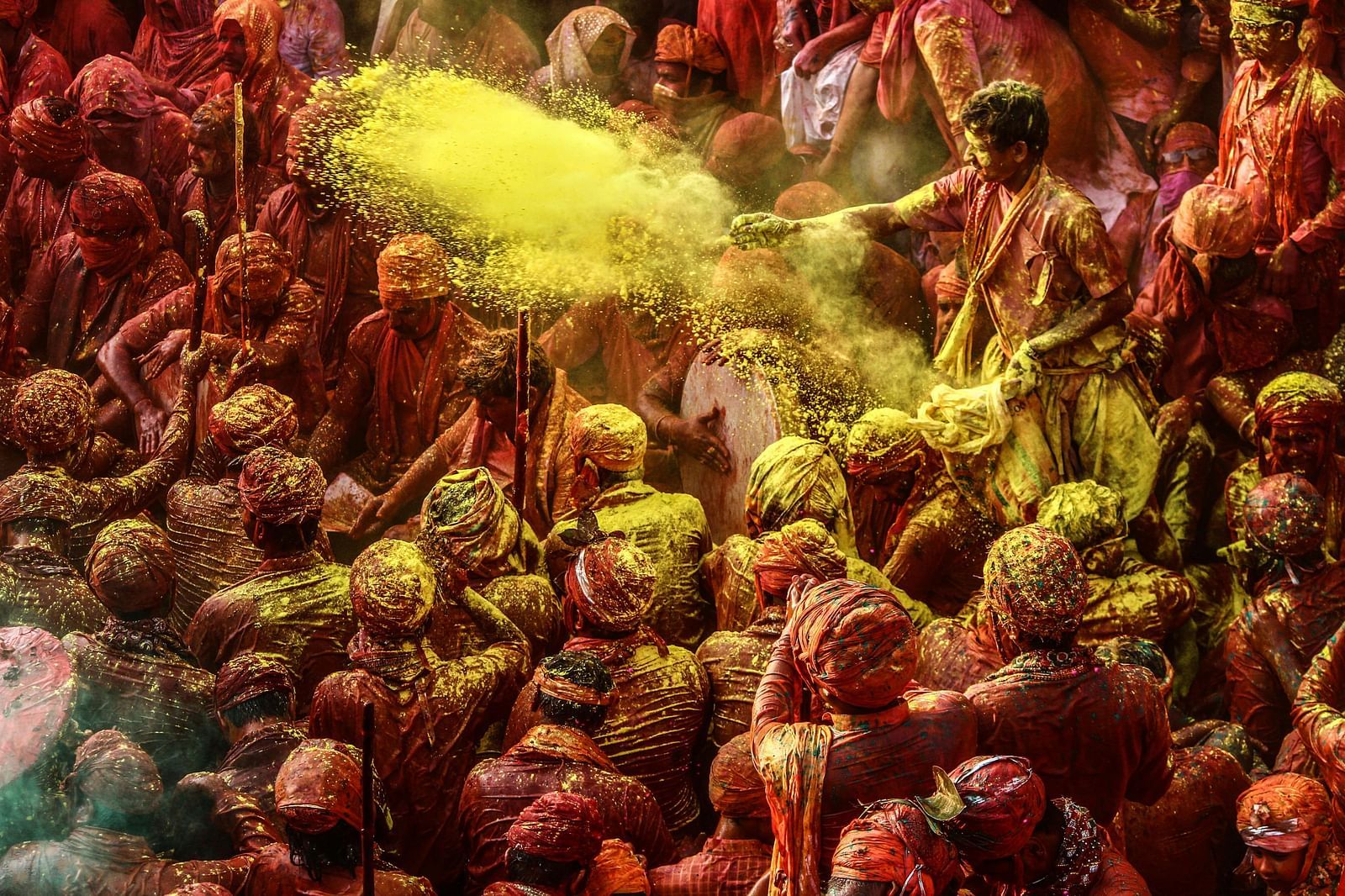 image of a crowd playing with powdered colours and enjoying it