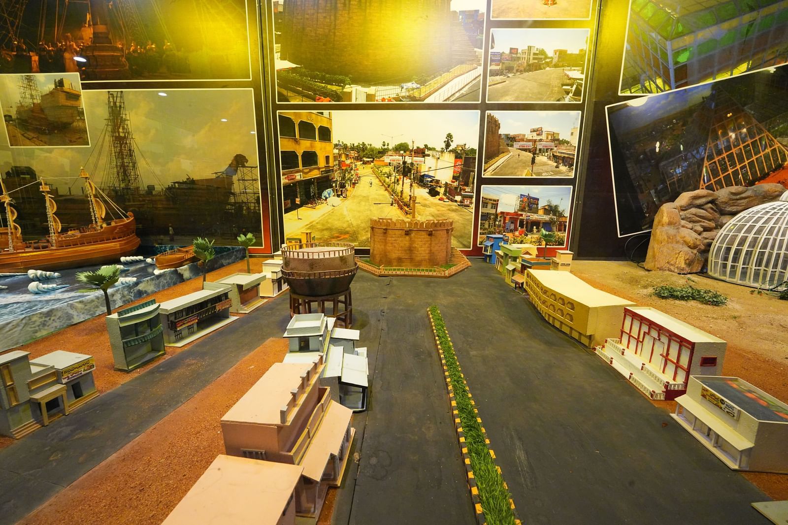 Exhibit of Kurnool town Konda Reddy fort replica at Ramoji Film City, showcasing a detailed miniature street and structures.