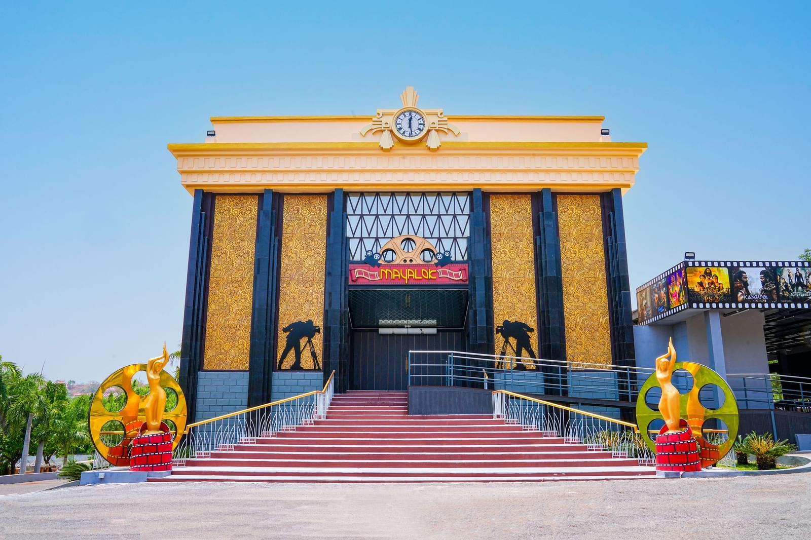 Front view of a new tourist attraction building at Ramoji Film City, featuring a grand entrance with colorful decorations.