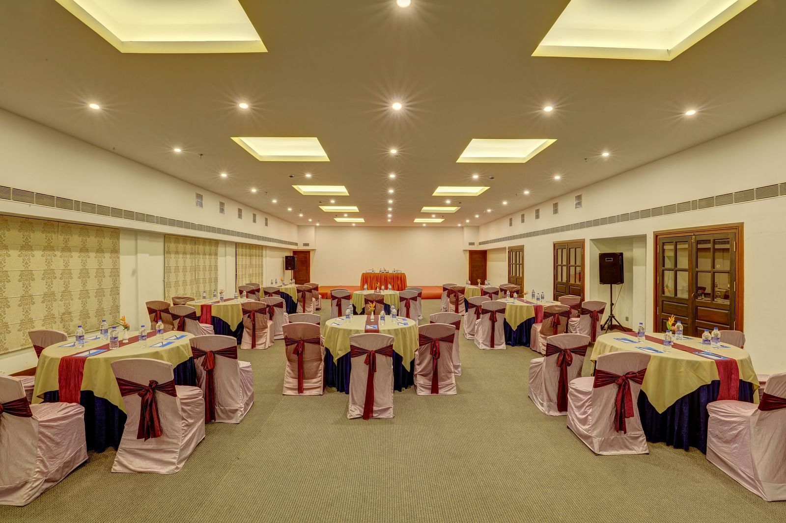 an overview of a Banquet hall in a cluster style arrangement - Rhythm Kumarakom.