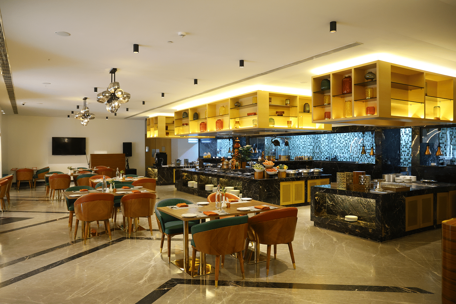 Relax in comfort at The bar, where plush interiors enhance your dining experience.