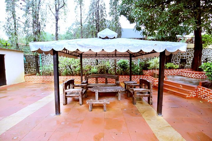 the outside seating space at the resort in Lonavala - Zara's Resort