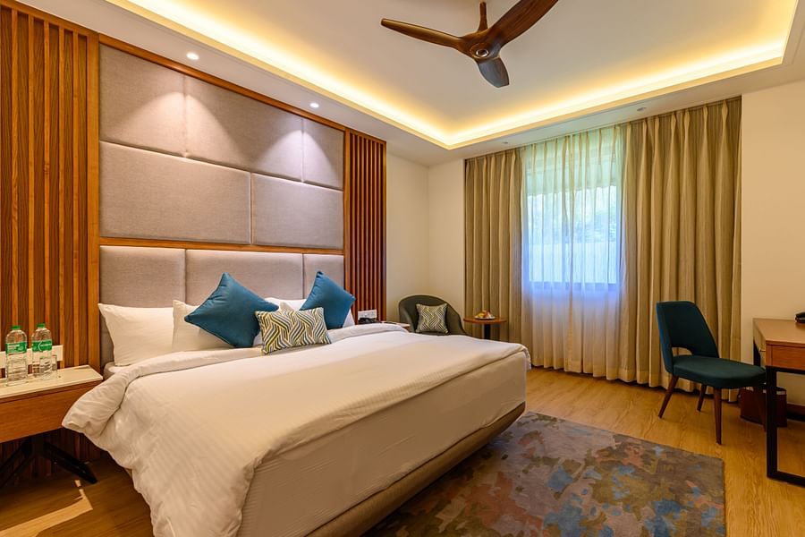 double bed and work desk and chair in one of our rooms