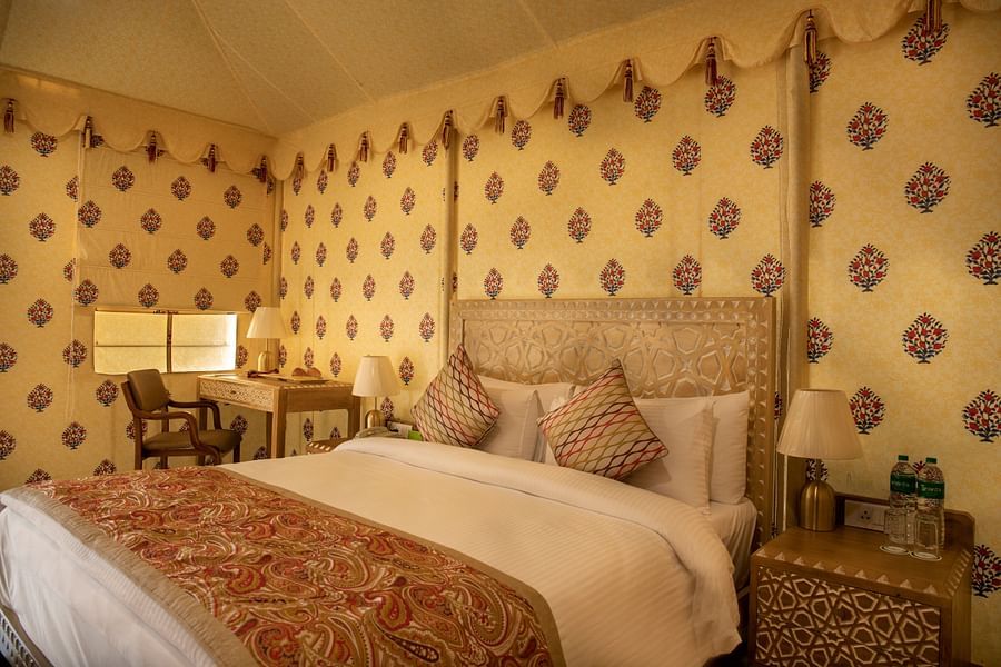 The bed and the furnishings of our luxury tent rooms in Pushkar 