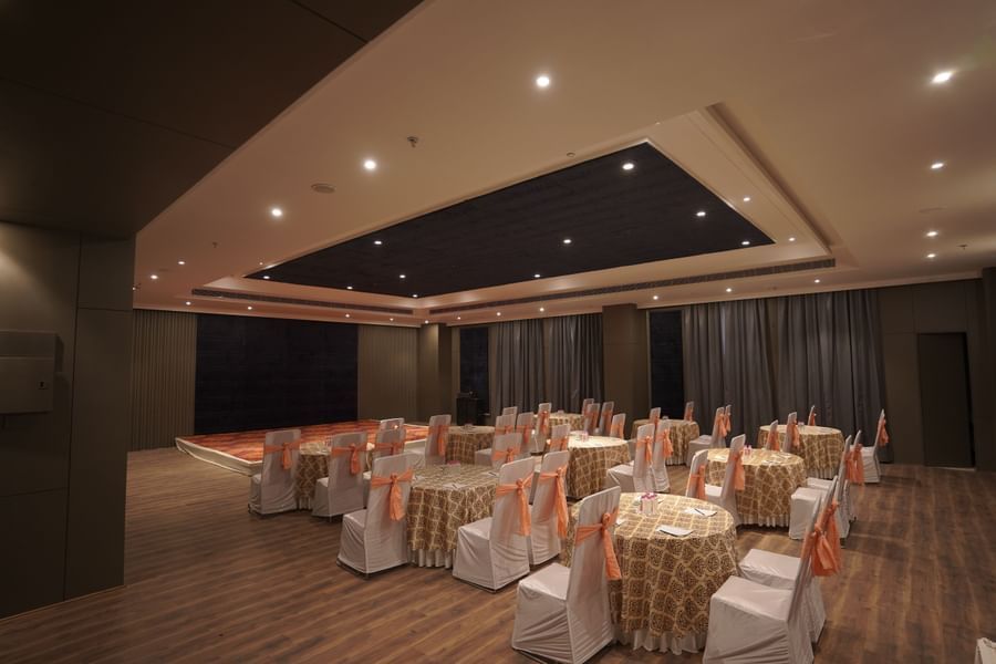 banquet hall with lighting and tables and chairs at Classic Sapphire by Ananta